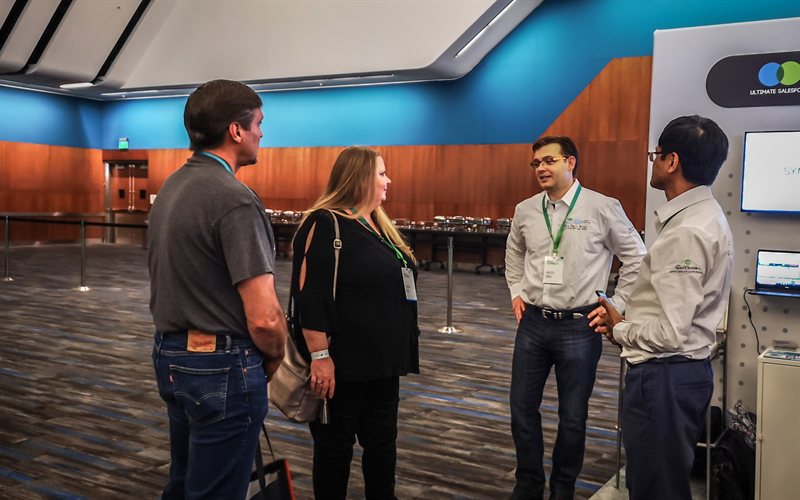 SyncQ team engaging with conference visitors